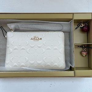 NWT coach wristlet with apple and heart charms